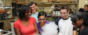 students in a lab with dry ice experiment