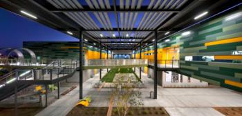 modern campus walkway at dusk