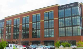 brick building with 'daymar college' sign